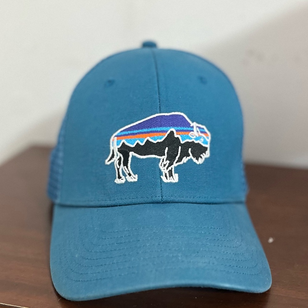 Blue Patagonia Trucker Hat with Buffalo Logo. One size fits all